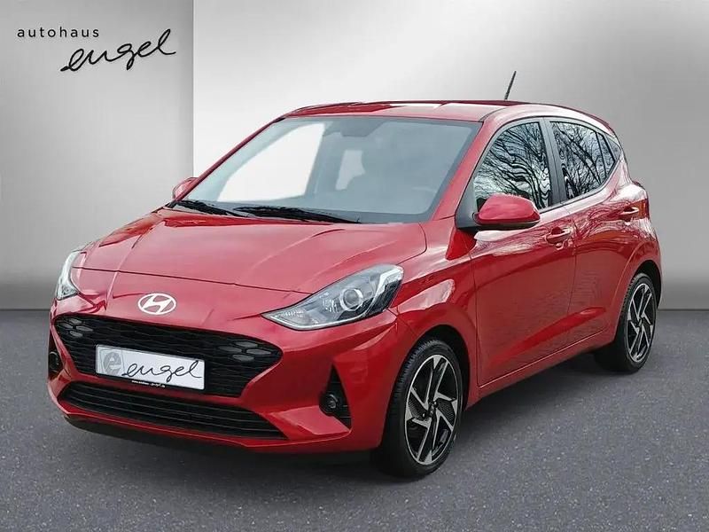 Dragon red Gebraucht 2024 Hyundai i10 Comfort Kleinwagen | 16.985 € (Fairer Preis) - Bild 1/4
