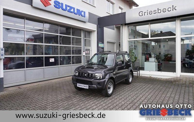 Grau Gebraucht 2014 Suzuki Jimny Comfort SUV | 16.990 € (Teuer) - Bild 1/4
