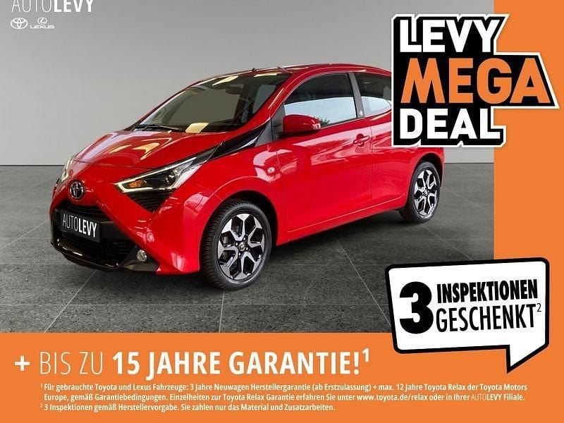 Vulcanorot Gebraucht 2021 Toyota Aygo Team Kleinwagen | 10.890 € (Fairer Preis) - Bild 1/4