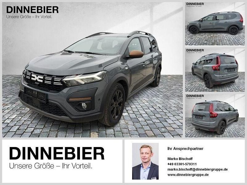 Grau (metallic) Gebraucht 2023 Dacia Jogger Extreme Van / Kleinbus | 19.964 € (Fairer Preis) - Bild 1/4