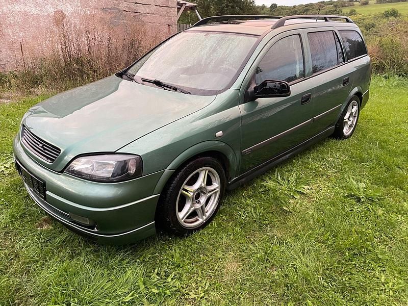 Grün Gebraucht 1999 Opel Astra Kombi | 750 € (Fairer Preis) - Bild 1/4