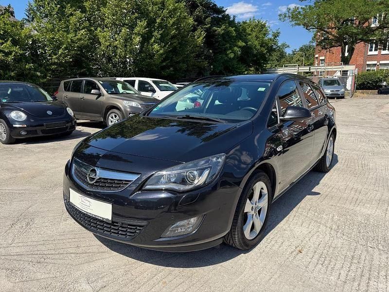 Saphirschwarz/black sapphire Gebraucht 2011 Opel Astra Design Edition Kombi | 3.499 € (Guter Preis) - Bild 1/4