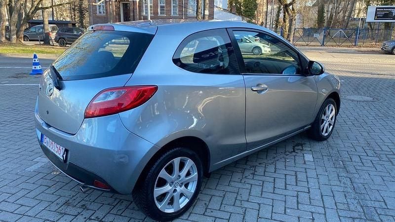 Second-hand Mazda 2 Active 75 CP (55 kW) 2011 Argintiu Hatchback