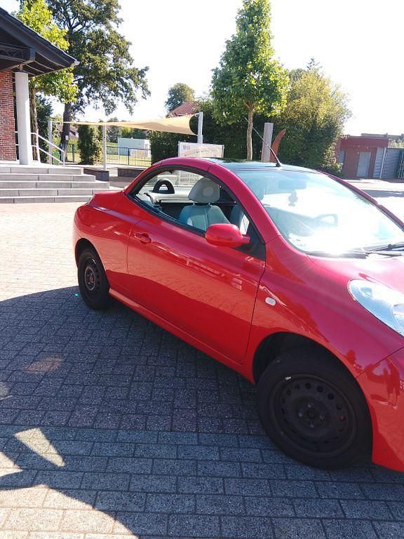 Rot Gebraucht 2006 Nissan Micra C+C Premium Edition Cabrio | 1.100 € (Superpreis) - Bild 1/4