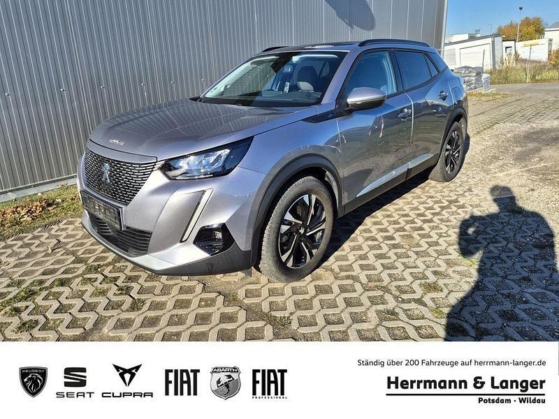 Grau / artense grau (metallic) Gebraucht 2021 Peugeot e-2008 Allure SUV | 18.499 € (Fairer Preis) - Bild 1/4