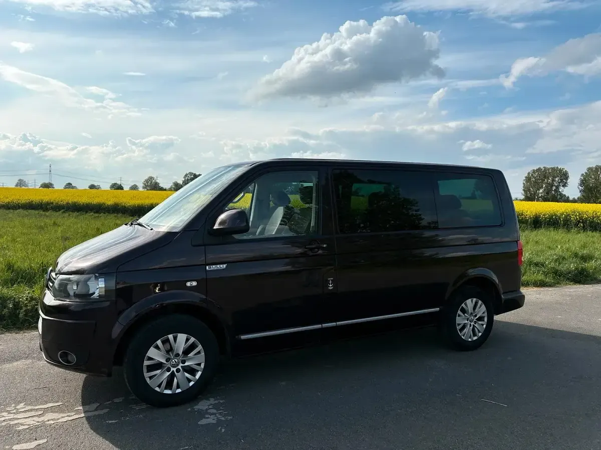 Używany VW Multivan 114 KM (83 kW) 2013 Purpurowy Minivan