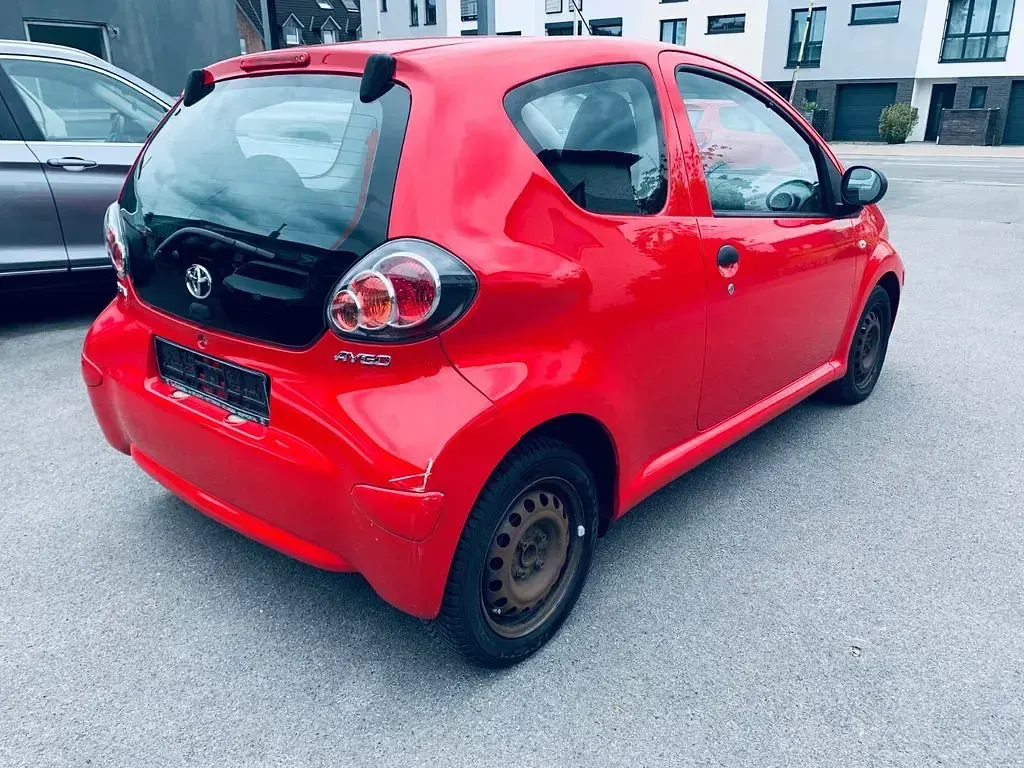 Gebraucht Toyota Aygo 68 PS (50 kW) 2009 Rot Kleinwagen