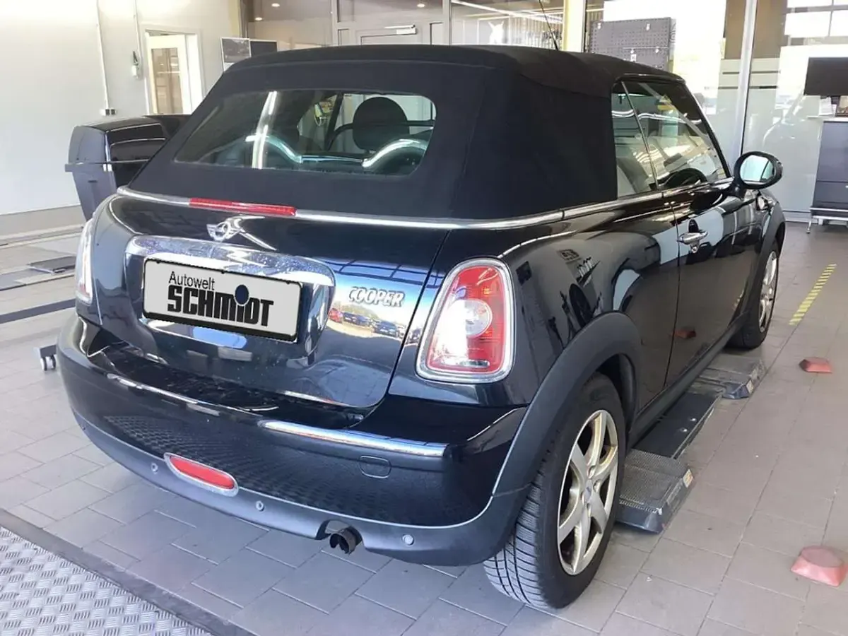 Käytetty Mini Cooper Cabriolet 122 HP (89 kW) 2011 Musta Avoauto