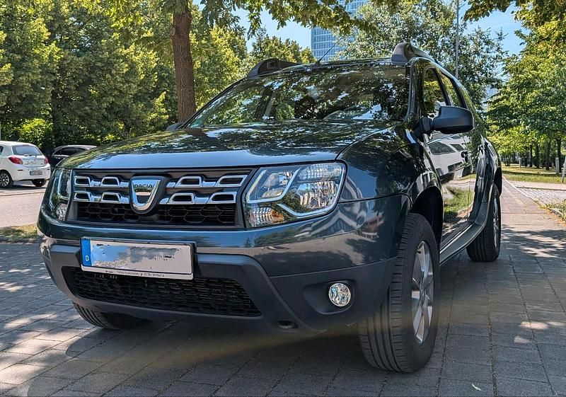 Grau Gebraucht 2014 Dacia Duster SUV | 6.799 € (Fairer Preis) - Bild 1/4