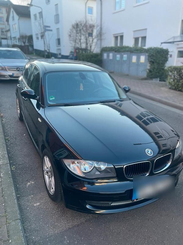 Gebraucht BMW 116 122 PS (89 kW) 2009 Schwarz Kleinwagen