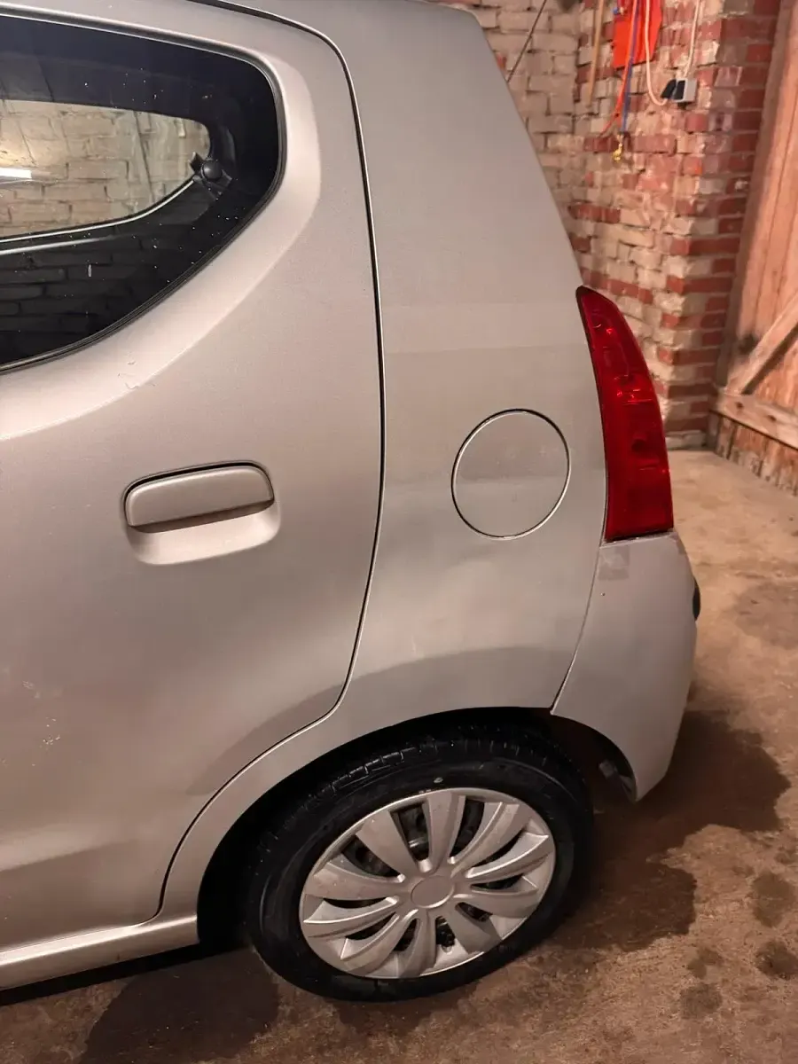 Gebraucht Nissan Pixo 69 PS (50 kW) 2010 Silber Kleinwagen