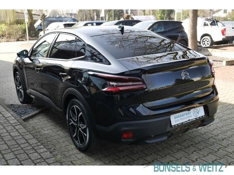 Gebraucht Citroën e-C4 Shine 100 kW (136 PS) 2023 Schwarz metallic Limousine