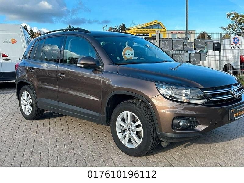 Braun Gebraucht 2012 VW Tiguan Track & Field SUV | 10.999 € (Fairer Preis) - Bild 1/4