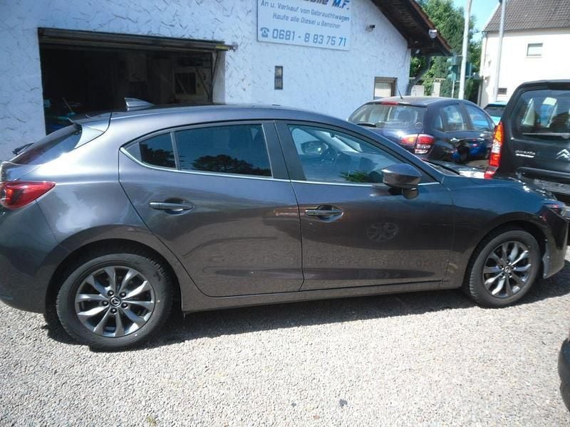 Grau Gebraucht 2019 Mazda 3 Exclusive-Line Limousine | 15.690 € (Superpreis) - Bild 1/4