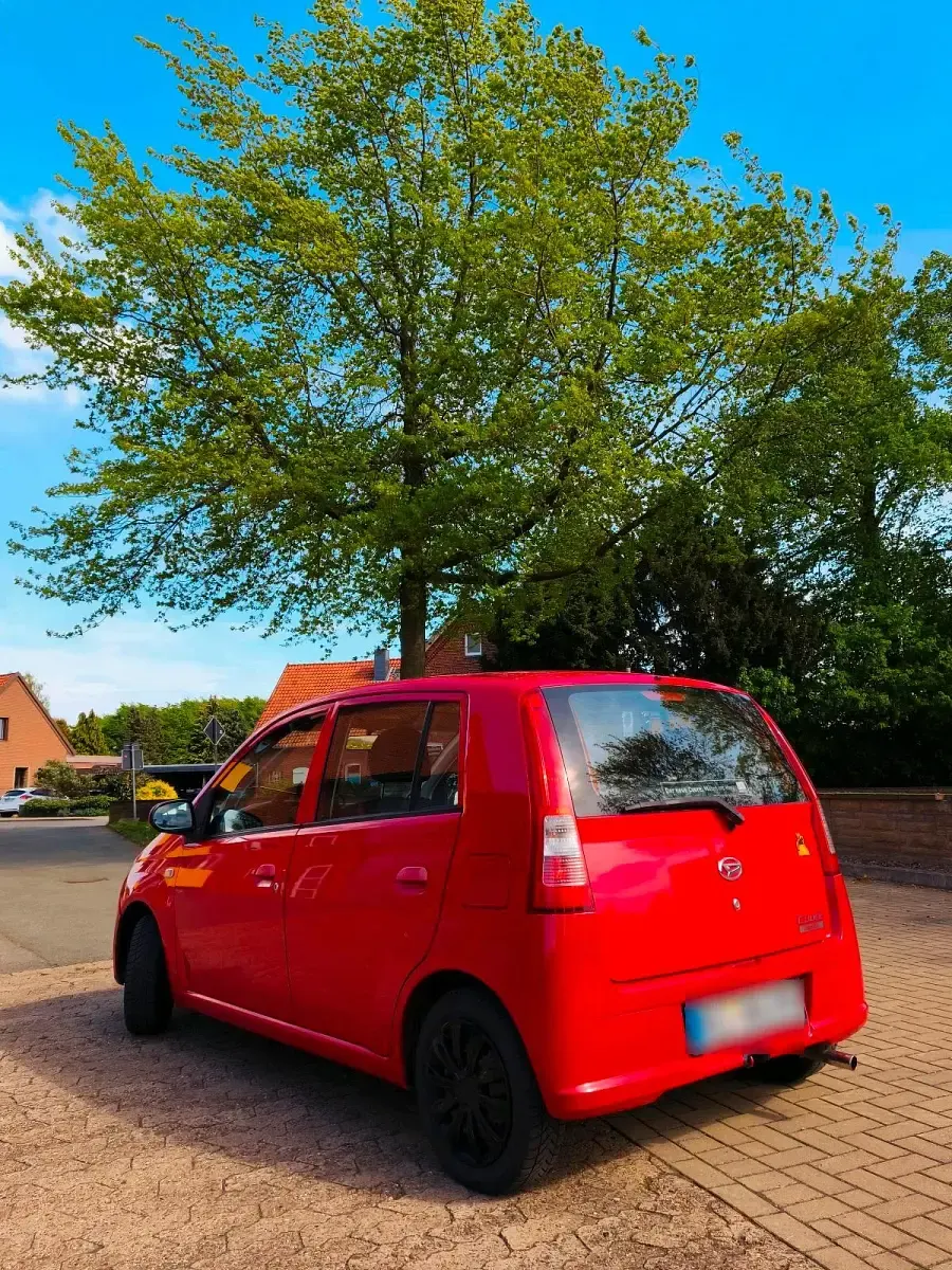 Gebraucht Daihatsu Cuore 58 PS (42 kW) 2006 Rot Kleinwagen
