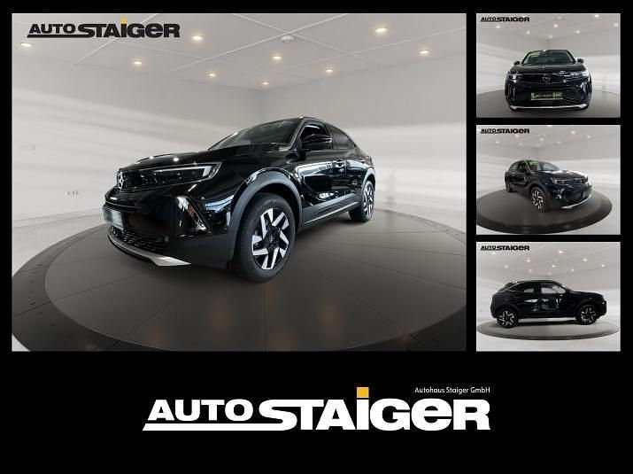 Lackierung schwarz perla nera/ Gebraucht 2023 Opel Mokka Elegance SUV | 23.490 € (Fairer Preis) - Bild 1/4