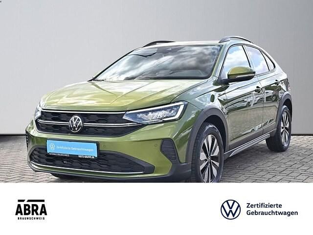 Visual green metallic Gebraucht 2024 VW Taigo Move SUV | 20.950 € (Fairer Preis) - Bild 1/4
