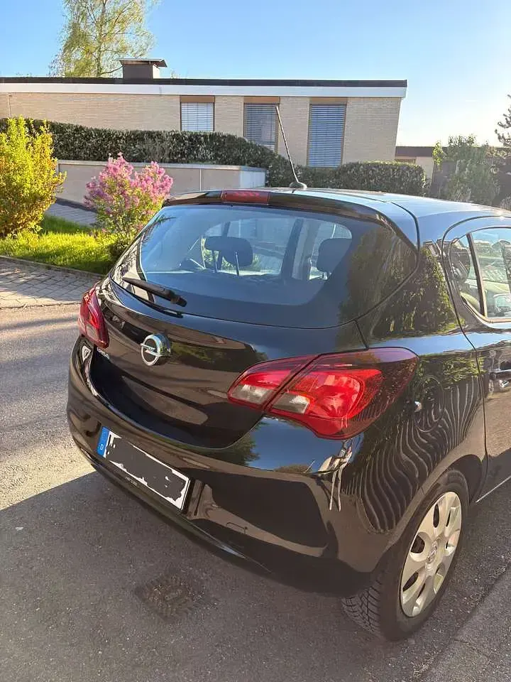 Używany Opel Corsa Edition 70 KM (51 kW) 2017 Czarny Hatchback