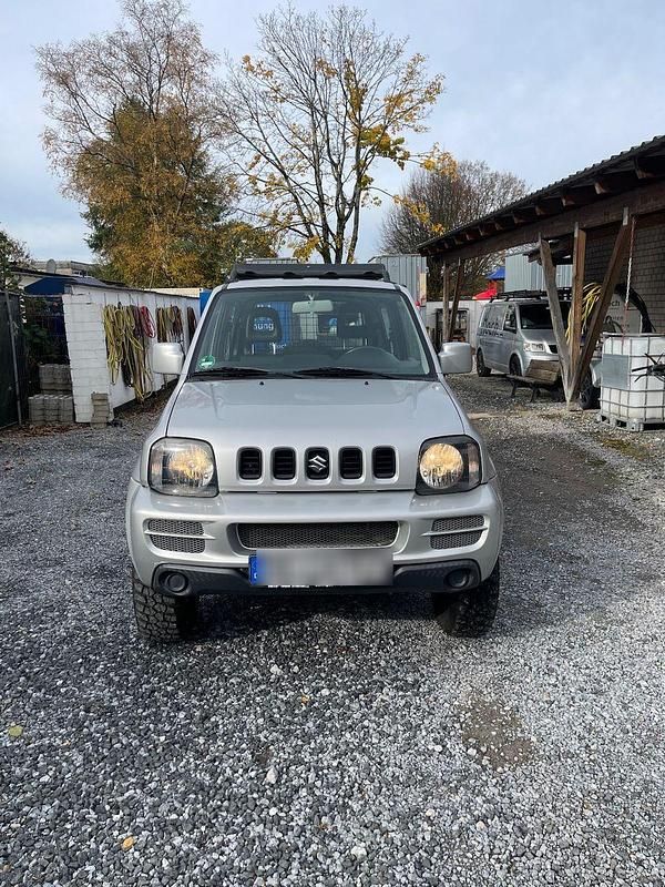 Silber Gebraucht 2010 Suzuki Jimny Comfort SUV | 11.500 € (Fairer Preis) - Bild 1/4