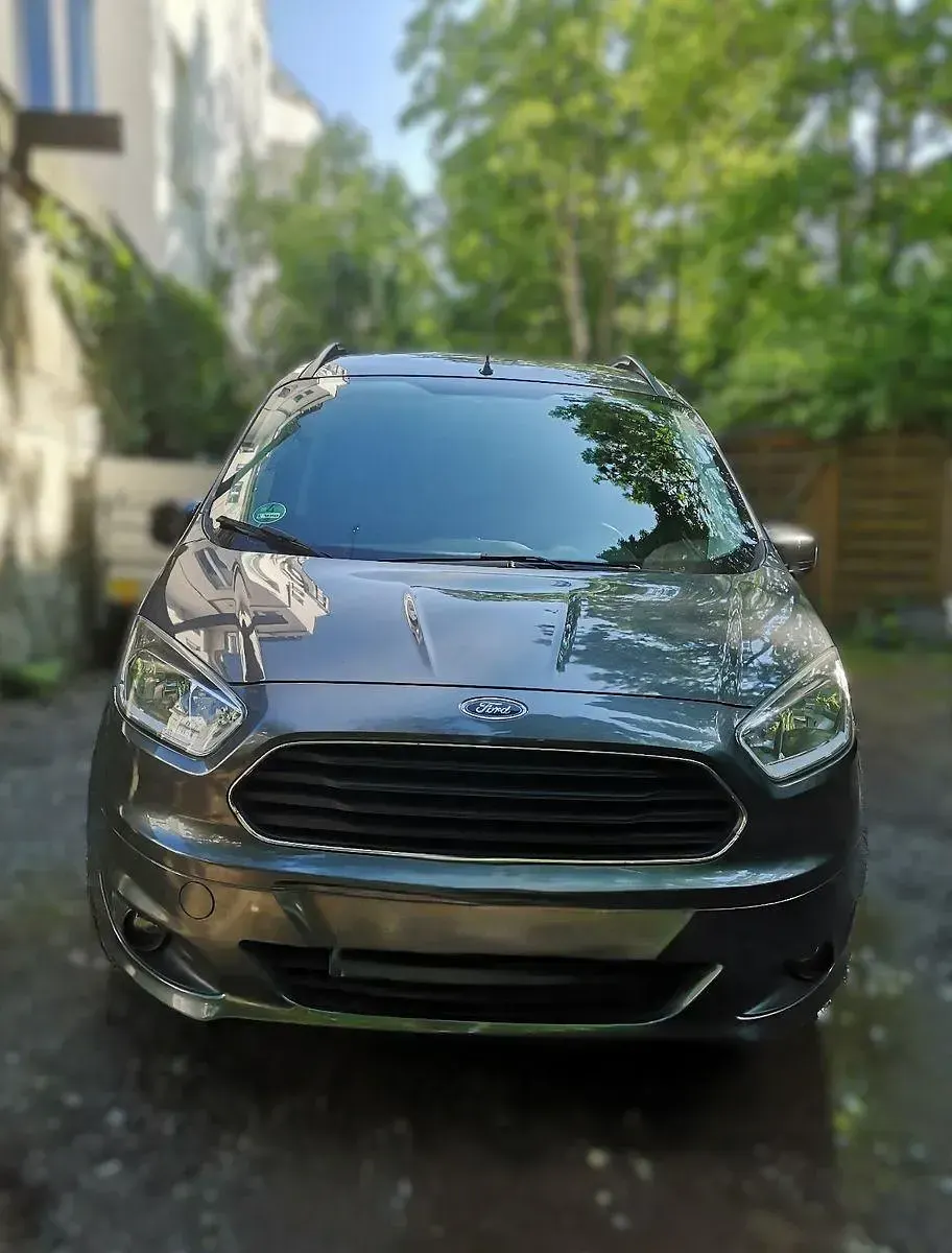 Gebraucht Ford Tourneo Courier 101 PS (74 kW) 2016 Grau Van / Kleinbus