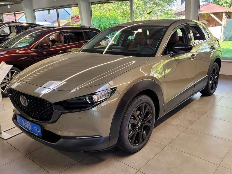 Zircon sand Neu 2024 Mazda CX-30 Nagisa SUV | 32.990 € - Bild 1/4