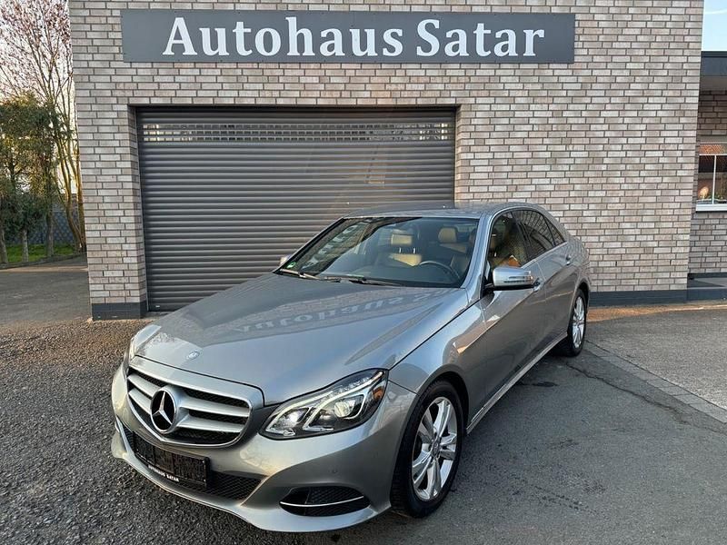 Second-hand Mercedes E200 184 CP (135 kW) 2013 Argintiu Berlinǎ