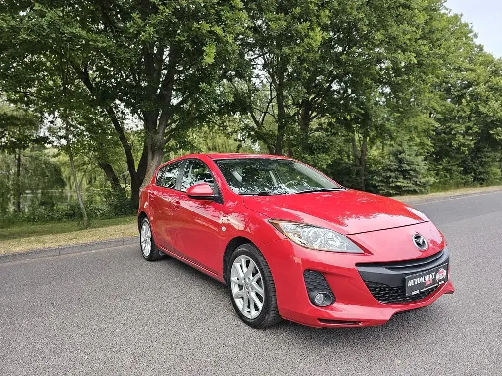Używany Mazda 3 Edition 150 KM (110 kW) 2012 Czerwony Sedan/Limuzyna