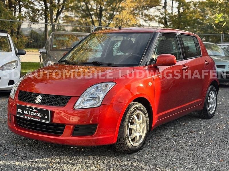 Orange Gebraucht 2009 Suzuki Swift Limousine | 2.999 € (Guter Preis) - Bild 1/4