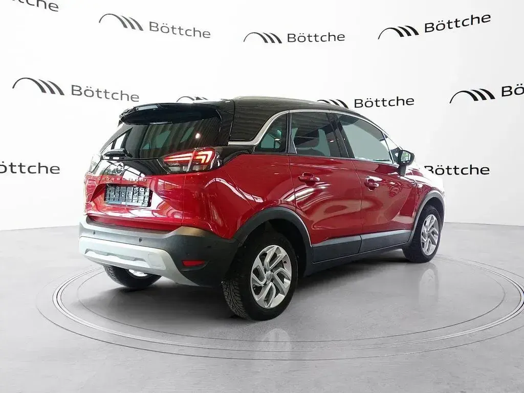 Gebraucht Opel Crossland Ultimate 131 PS (96 kW) 2024 Lackierung peperoncino red/met SUV