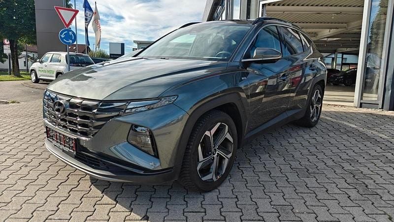 Grün Gebraucht 2022 Hyundai Tucson Prime SUV | 29.290 € (Fairer Preis) - Bild 1/4