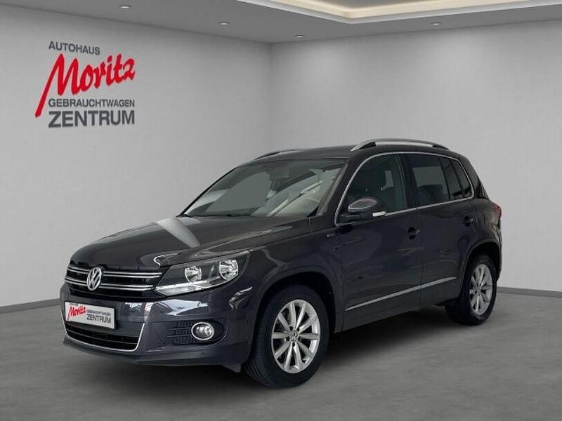 Kryptongrau metallic (metallic) Gebraucht 2015 VW Tiguan Sport SUV | 14.890 € (Teuer) - Bild 1/4