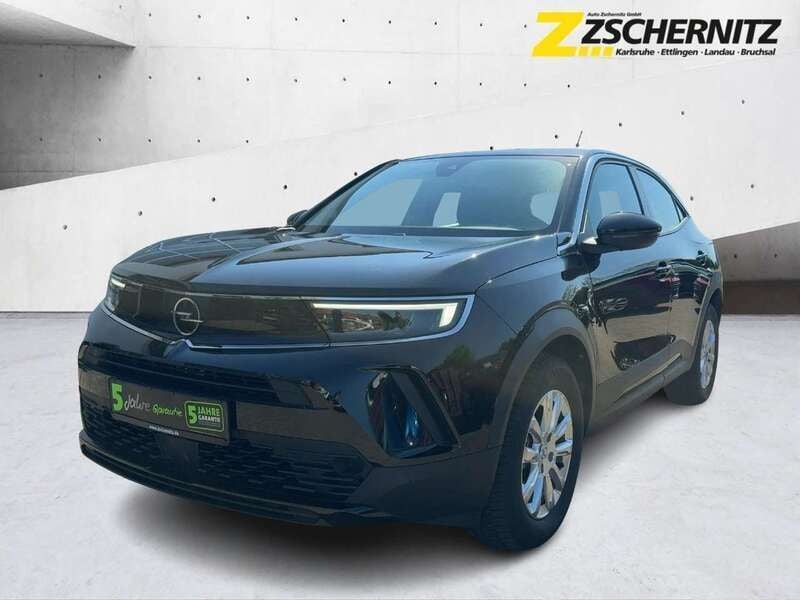 Diamant schwarz/karbon schwarz Gebraucht 2022 Opel Mokka-e Edition SUV | 16.480 € (Superpreis) - Bild 1/4
