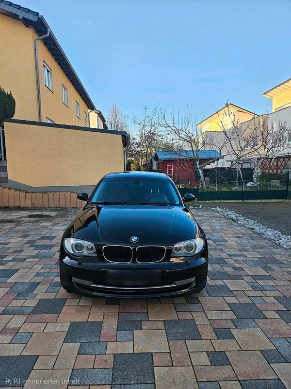 Usata BMW 116 122 CV (89 kW) 2009 Nero Utilitaria