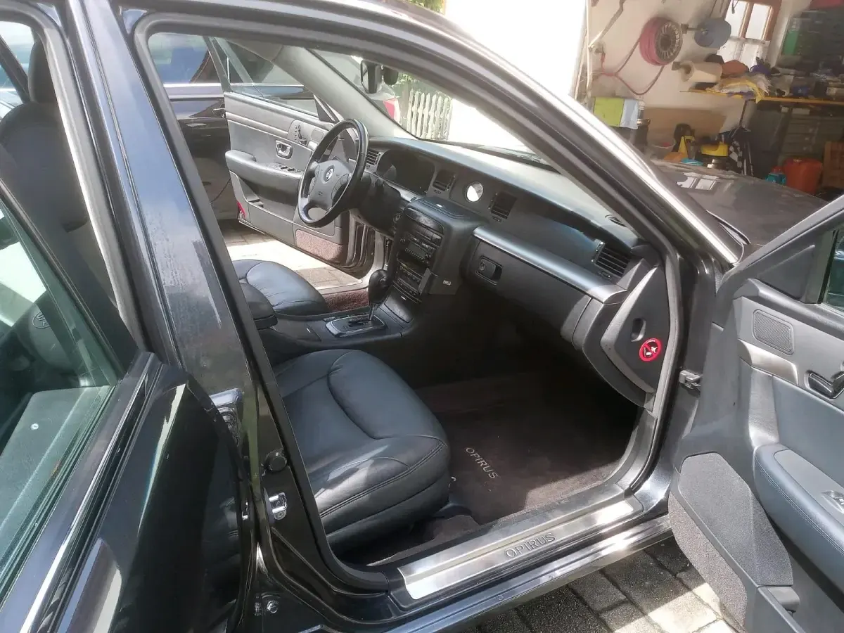 Gebraucht Kia Opirus 203 PS (149 kW) 2006 Schwarz Limousine