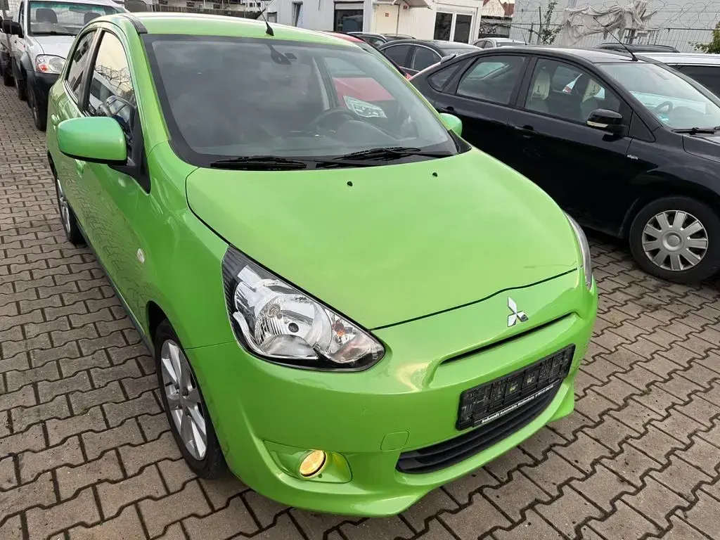 Gebraucht Mitsubishi Space Star 80 PS (58 kW) 2013 Grün Van / Kleinbus