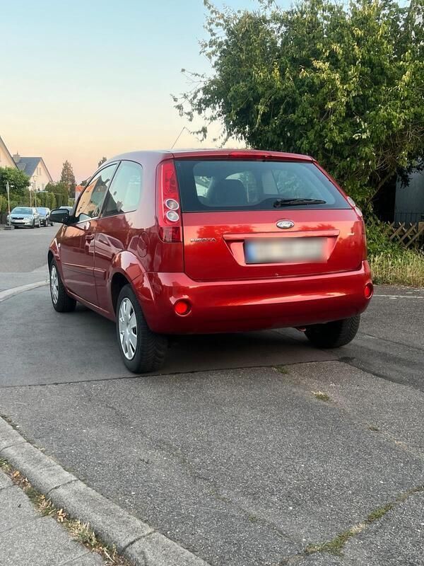 Orange Gebraucht 2007 Ford Fiesta Kleinwagen | 2.100 € - Bild 1/4