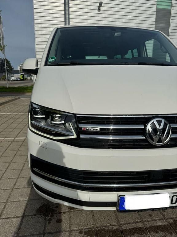Second-hand VW Multivan Generation Six 204 CP (150 kW) 2016 Alb Monovolum