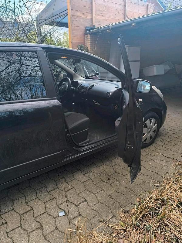 Second-hand Nissan Note 110 CP (80 kW) 2007 Negru Hatchback