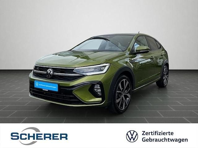 Visual green metallic Gebraucht 2022 VW Taigo IQ Drive SUV | 25.900 € (Fairer Preis) - Bild 1/3