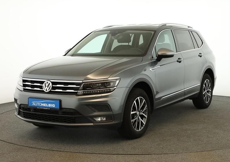 Platinum grey metallic Gebraucht 2021 VW Tiguan Allspace Comfortline SUV | 25.180 € (Superpreis) - Bild 1/4