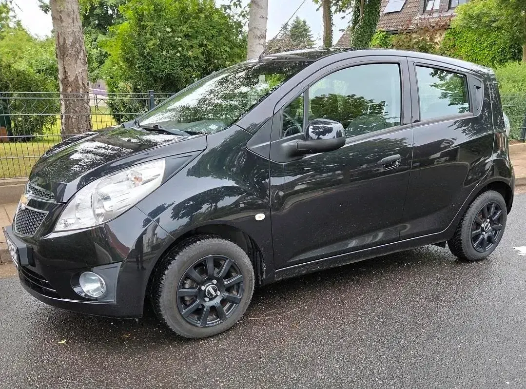 Gebraucht Chevrolet Spark 64 PS (47 kW) 2012 Schwarz Kleinwagen