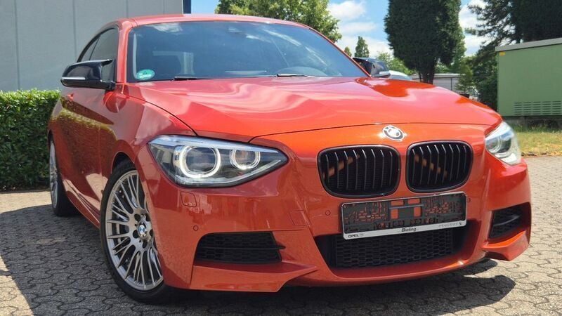 Orange Gebraucht 2013 BMW M135 Performance Kleinwagen | 14.900 € (Guter Preis) - Bild 1/4