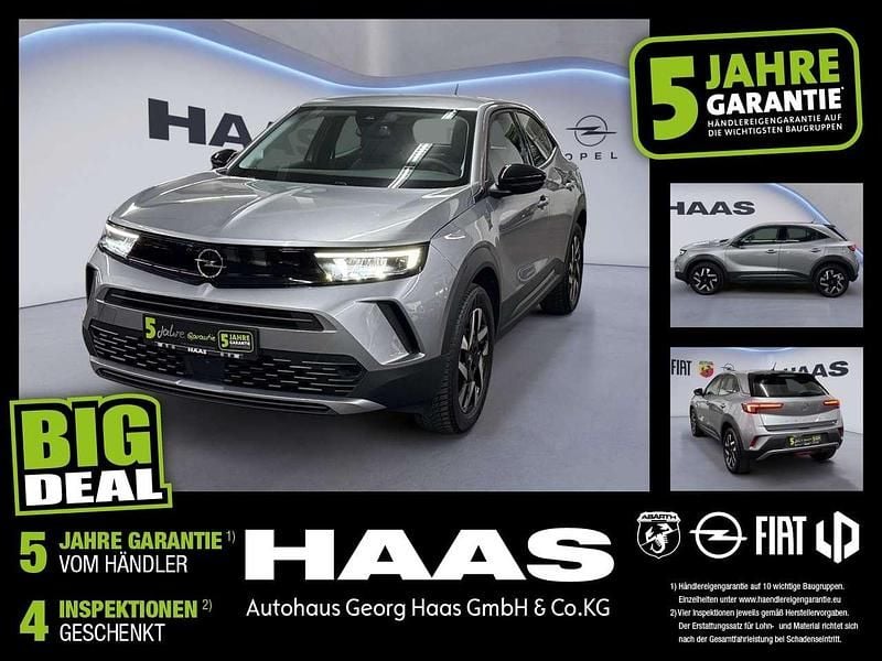 Lack grau artense/typ aussenverkleidung (metallic) Gebraucht 2024 Opel Mokka Elegance SUV | 20.490 € (Guter Preis) - Bild 1/4
