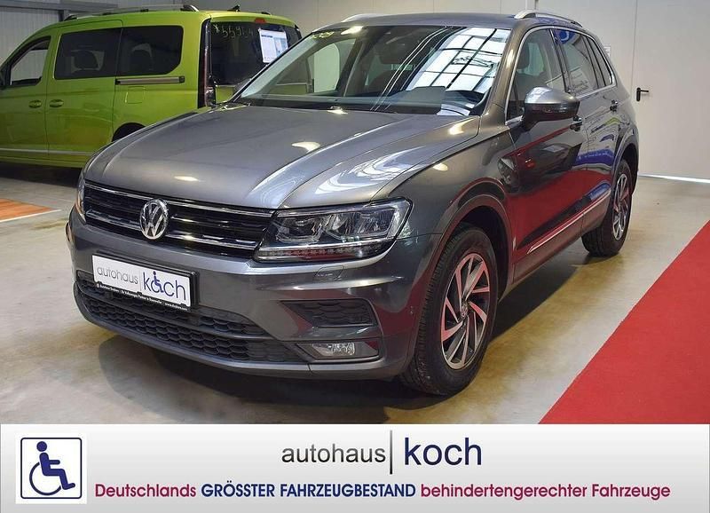 Indiumgrau Gebraucht 2018 VW Tiguan Sound SUV | 21.980 € (Fairer Preis) - Bild 1/4