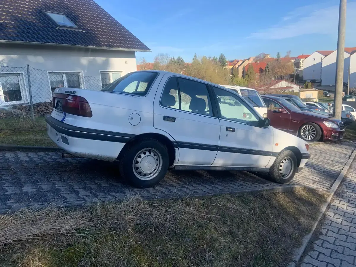 Gebraucht Mitsubishi Lancer 90 PS (66 kW) 1992 Weiß Limousine