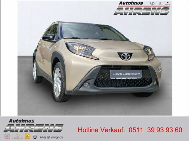 Ginger beige / night sky black Gebraucht 2022 Toyota Aygo X Pulse SUV | 15.490 € (Fairer Preis) - Bild 1/2