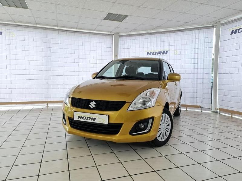 Gelb Gebraucht 2015 Suzuki Swift Club Kleinwagen | 7.990 € (Fairer Preis) - Bild 1/4