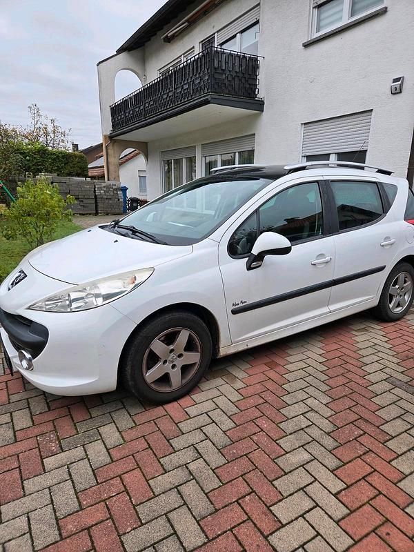 Weiß Gebraucht 2009 Peugeot 207 Kombi | 2.450 € (Fairer Preis) - Bild 1/4