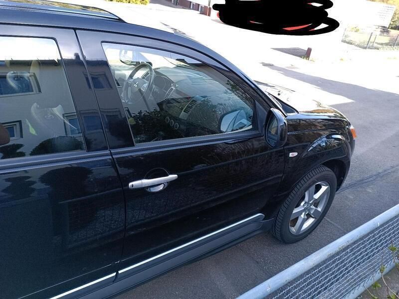 Schwarz Gebraucht 2010 Mitsubishi Outlander SUV | 10.450 € (Teuer) - Bild 1/4