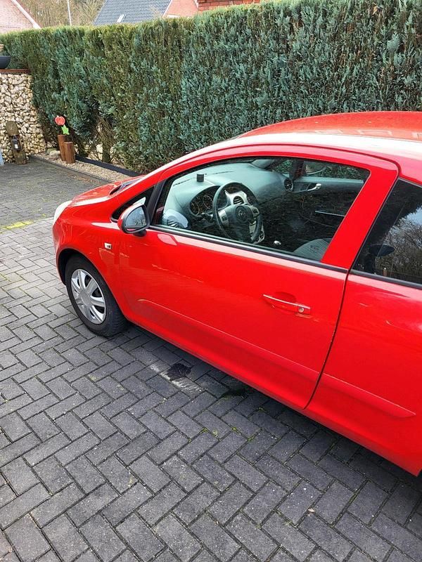 Gebraucht Opel Corsa 56 PS (41 kW) 2007 Rot Kleinwagen